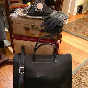Lodis Black Leather Briefcase/computer bag with adjustable shoulder strap.